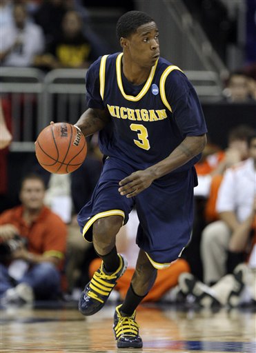 NCAA Michigan Clemson Basketball AP Photo/Charlie Riedel